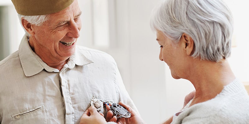 Nissan of Canton in Canton MI vet having wife pin medal