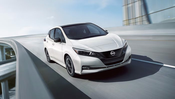 Nissan of Canton in Canton MI Nissan LEAF driving on an exit ramp