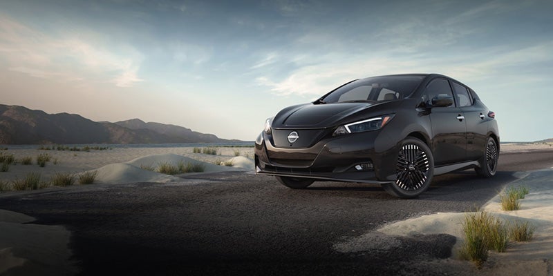 2025 Nissan LEAF<sup>&reg;</sup> at Nissan of Canton driving along a lake