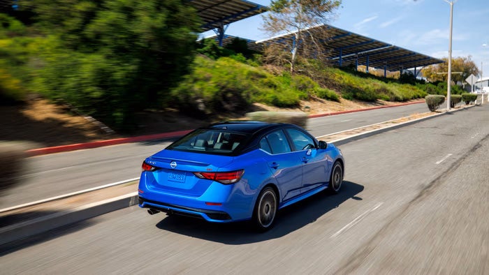 Nissan of Canton in Canton MI Nissan Sentra rear view driving on road