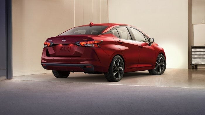 Nissan of Canton in Canton MI Nissan Versa parked inside garage